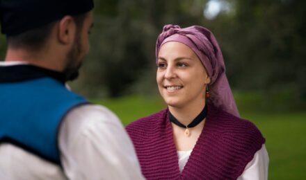 Cancer survivor with family and term life insurance policy document