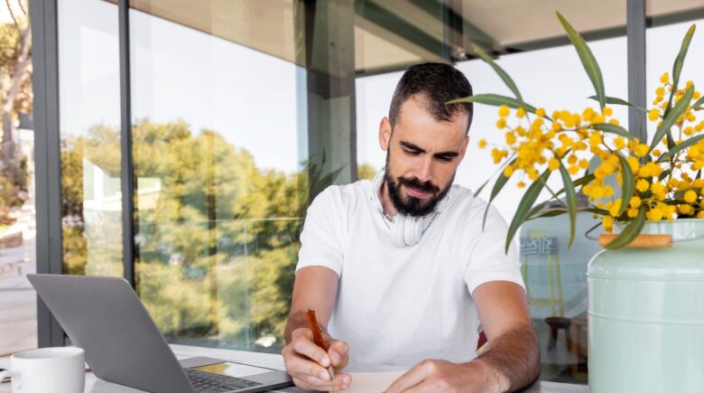 Freelancer reviewing insurance documents and building a complete coverage plan at home office