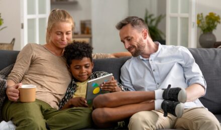 A family discussing financial planning with a term life insurance policy