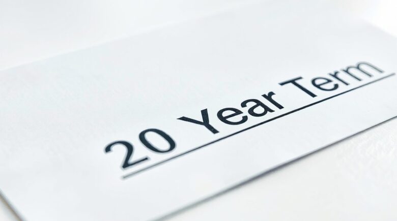 A 40-year-old homeowner reviewing life insurance options with a mortgage