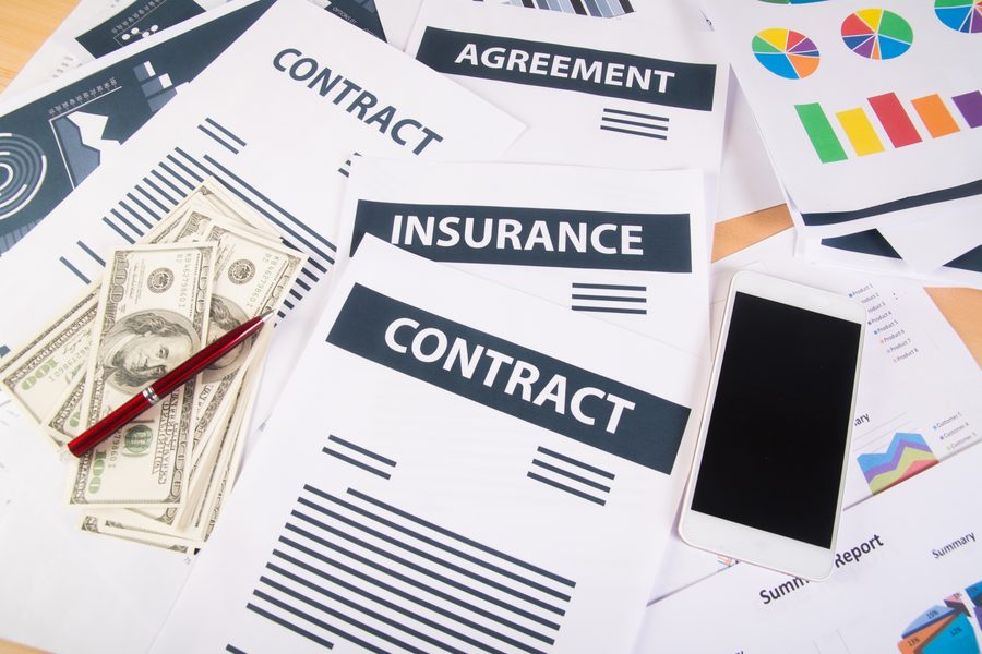 Insured person at age 70 reviewing an expired term policy document
