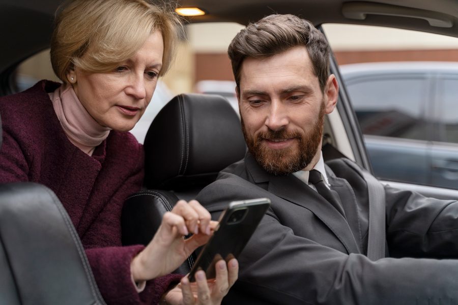 Smartphone showing a rideshare endorsement quote on an insurance app