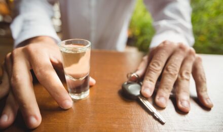 Colorado driver reviewing auto insurance documents after DUI charge
