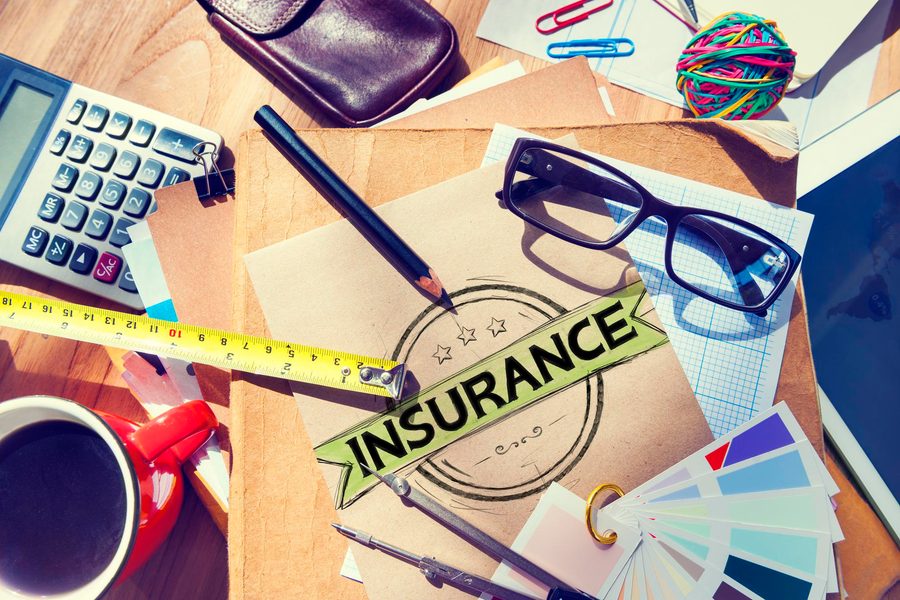 Planner receiving insurance payout check